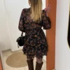 Robe courte fleurie noire manches bouffantes