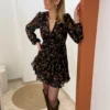Robe courte fleurie noire manches bouffantes