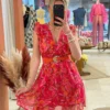 Robe courte fuchsia motifs femme, col cache-cœur | Dream By C