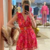 Robe courte fuchsia motifs femme, col cache-cœur | Dream By C